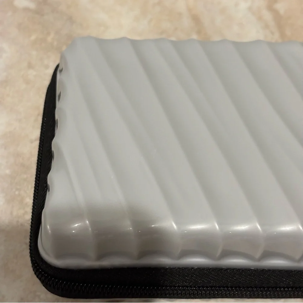 Tumi hard suitcase style cosmetic case